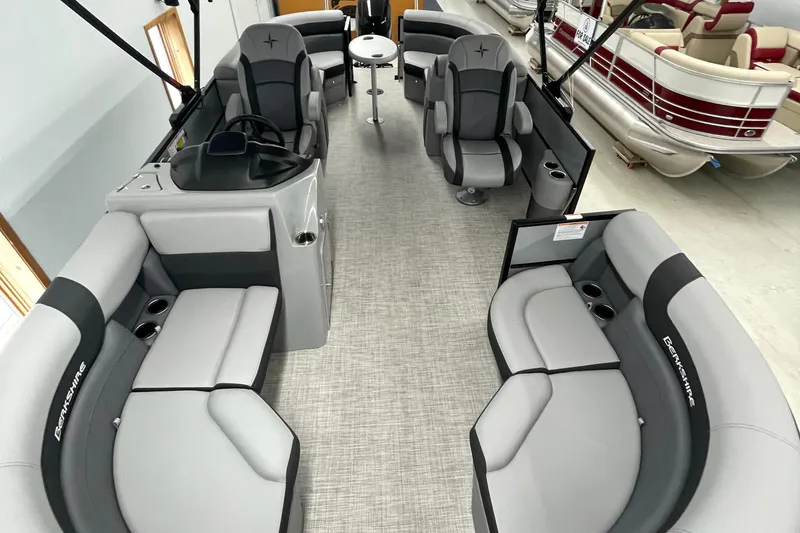 Slide: The Image of 2023 Berkshire 22RFX CTS pontoon boat interior with gray seating and modern design. - 3