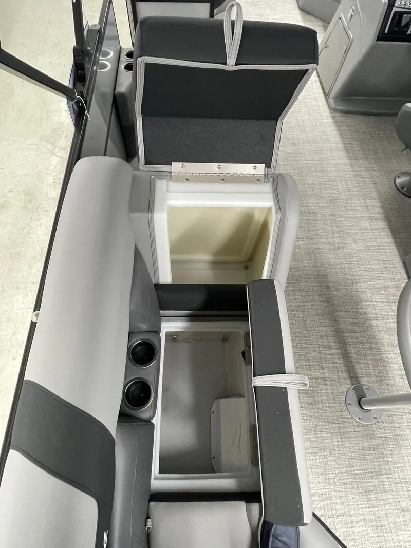 Slide: The Image of 2023 Berkshire 22RFX CTS boat interior storage compartments and seating. - 6