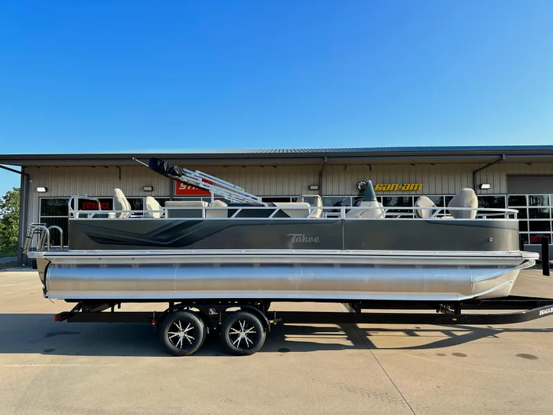 Slide: The Image of 2023 Tahoe Pontoon 25FT Sport 85 Center Console Fish boat on trailer. - 1