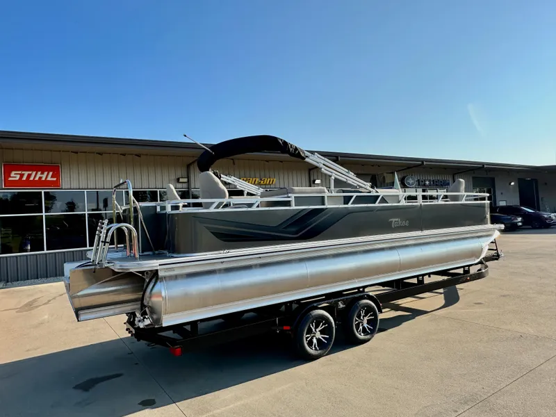 Slide: The Image of 2023 Tahoe Pontoon 25FT Sport 85 Center Console Fish on trailer outside dealership. - 4