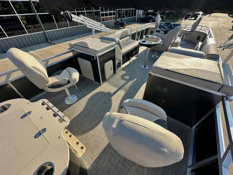 Slide: The Image of 2023 Tahoe Pontoon 25FT Sport 85 Center Console Fish interior with seating and console. - 9