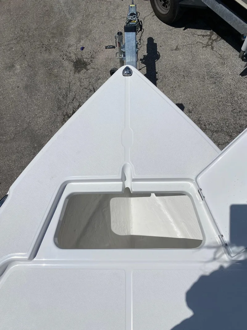 Slide: The Image of 2024 Savannah 220 IS boat bow with storage compartment - 14