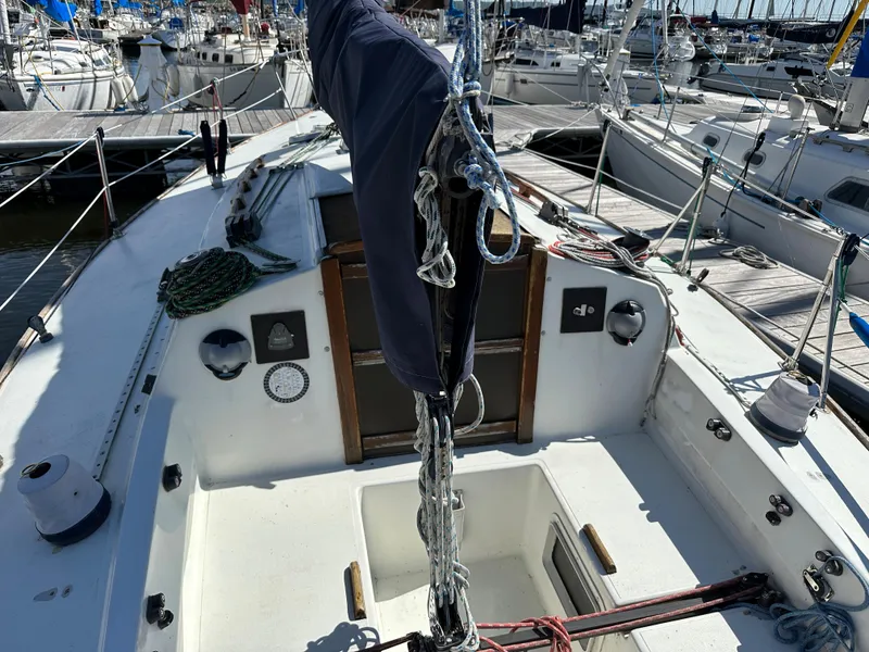 Slide: The Image of 1986 J Boats J30 sailboat cockpit in marina. - 2