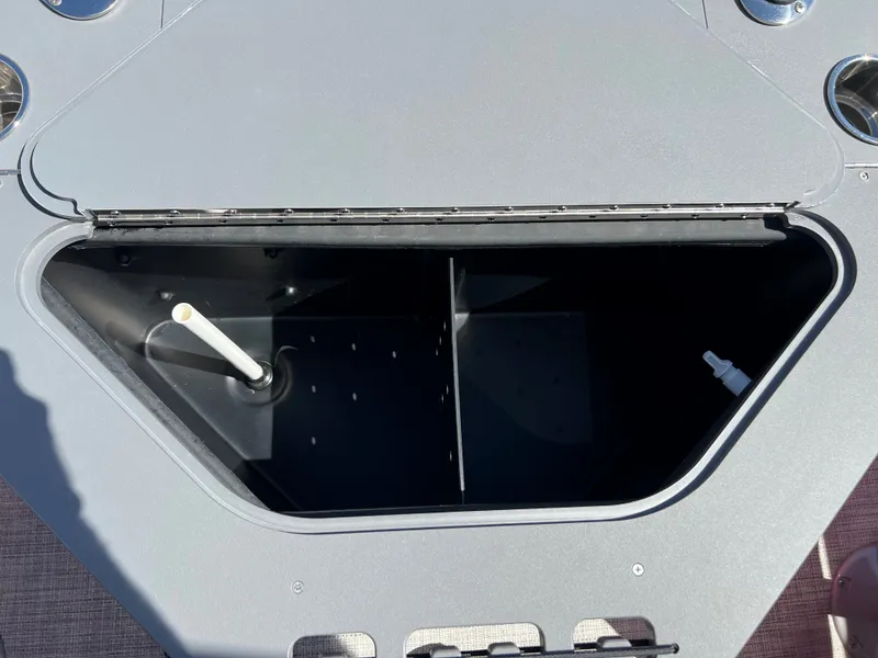 Slide: The Image of 2023 South Bay 22F 200 Series boat storage compartment. - 13