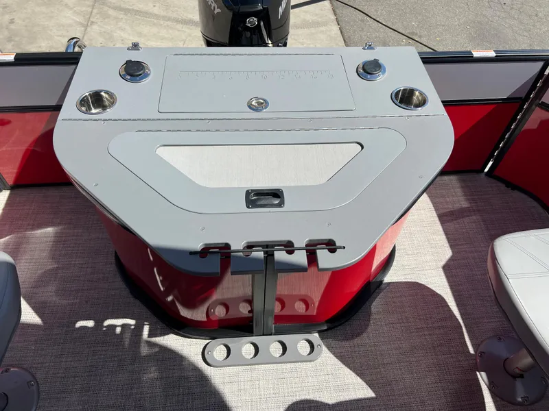 Slide: The Image of 2023 South Bay 22F 200 Series boat interior with seating and storage. - 19