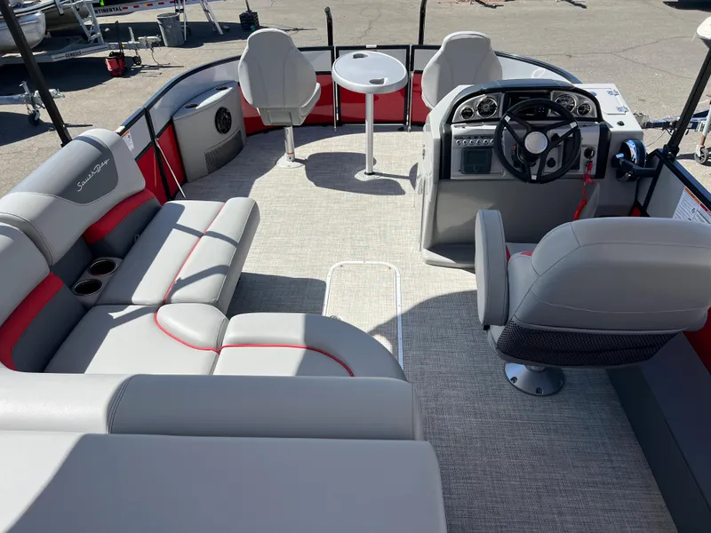 Slide: The Image of 2023 South Bay 22F 200 Series pontoon boat interior with seating and helm. - 20