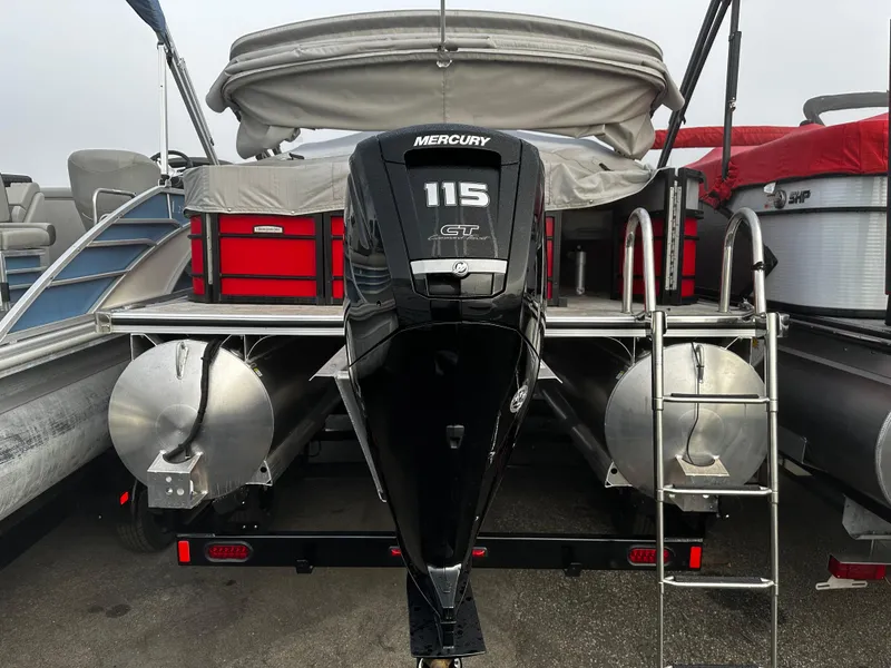 Slide: The Image of 2023 South Bay 22F 200 Series pontoon boat with Mercury 115 outboard motor. - 4