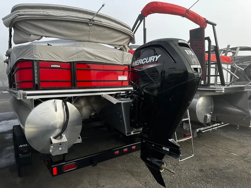 Slide: The Image of 2023 South Bay 22F 200 Series pontoon boat with Mercury outboard motor. - 5