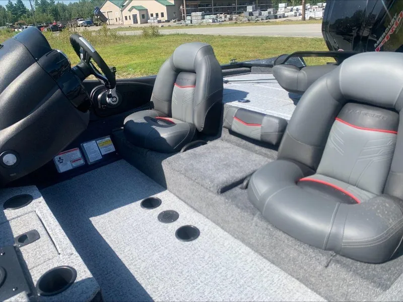 Slide: The Image of 2024 Tracker PT 195 XTE boat interior with gray and black seating. - 3