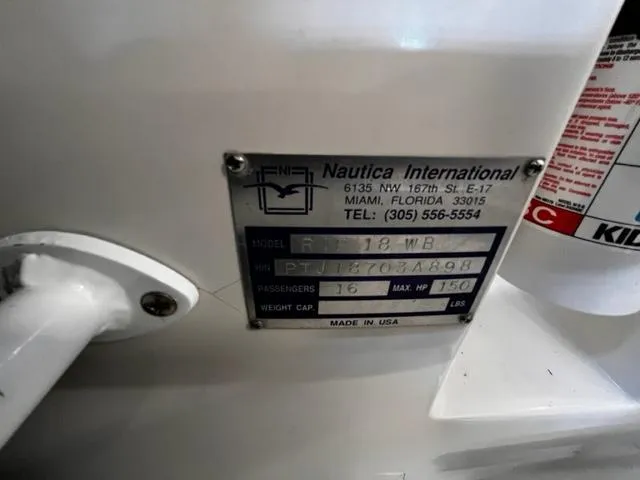 Slide: The Image of Nautica RIB 18 Widebody 1998 model information plate with specifications. - 13