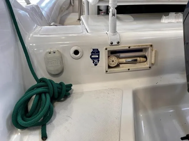 Slide: The Image of Close-up of 1998 Nautica RIB 18 Widebody boat interior with green rope. - 9