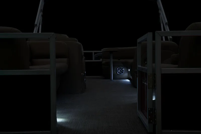 Slide: The Image of Interior of 2024 Ranger Reata 200C pontoon boat with ambient lighting. - 48