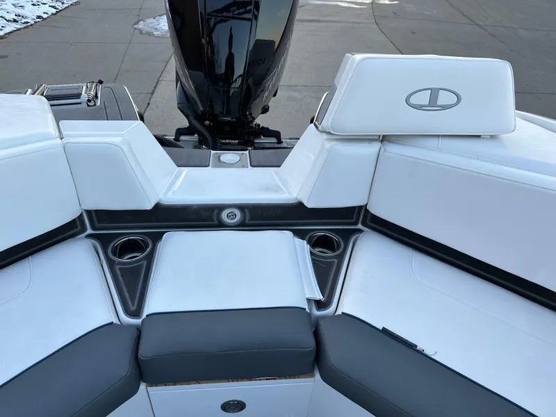 Slide: The Image of 2024 Tahoe 210 S boat interior with seating and cup holders. - 9