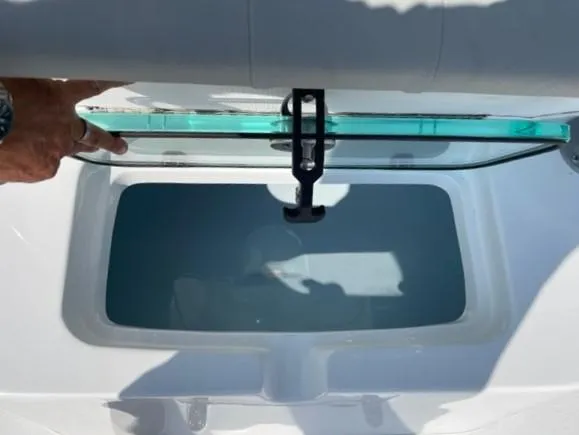 Slide: The Image of 2024 Cape Horn 31T livewell with open glass lid. - 10