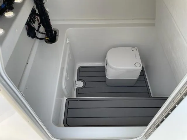 Slide: The Image of 2024 Cape Horn 31T boat interior with compact toilet. - 21