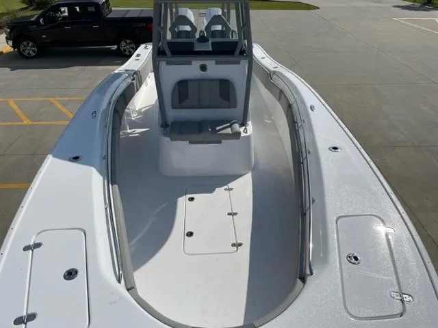 Slide: The Image of 2024 Cape Horn 31T boat interior view with spacious deck and seating. - 32