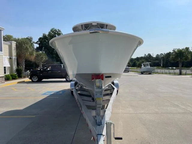 Slide: The Image of 2024 Cape Horn 31T boat on a trailer in a parking lot. - 4