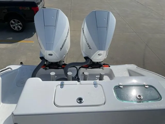 Slide: The Image of 2024 Cape Horn 31T boat with twin Mercury outboard engines. - 6