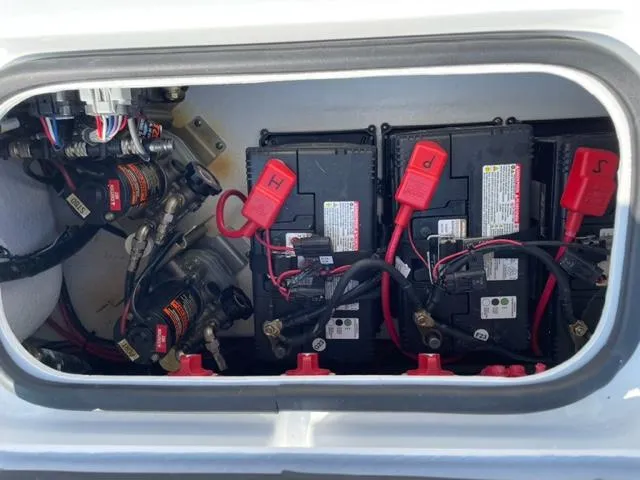 Slide: The Image of Battery compartment of 2024 Cape Horn 31T boat with wiring and connections. - 7