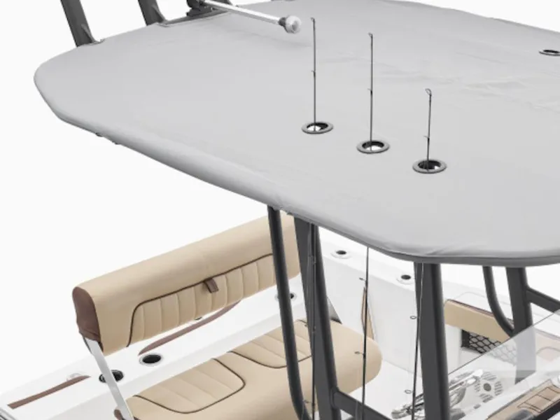 Slide: The Image of 2024 Yamaha Boats 222 FSH Sport with covered fishing rod holders and beige seating. - 5