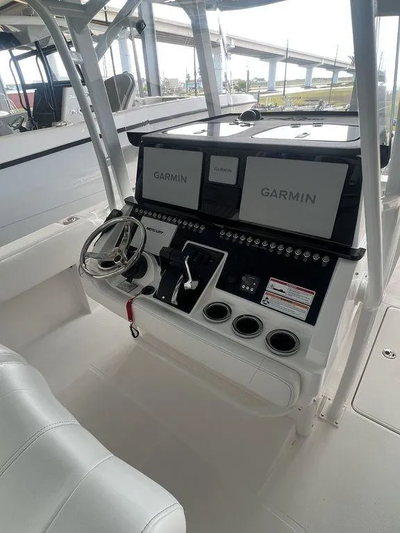 Slide: The Image of 2024 Fountain 34 TE boat console with Garmin navigation system. - 10
