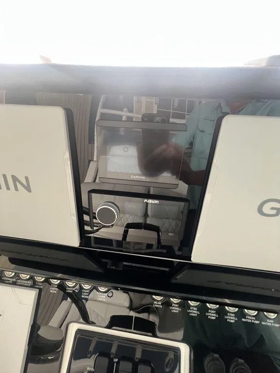 Slide: The Image of 2024 Fountain 34 TE boat dashboard with Garmin navigation system. - 12