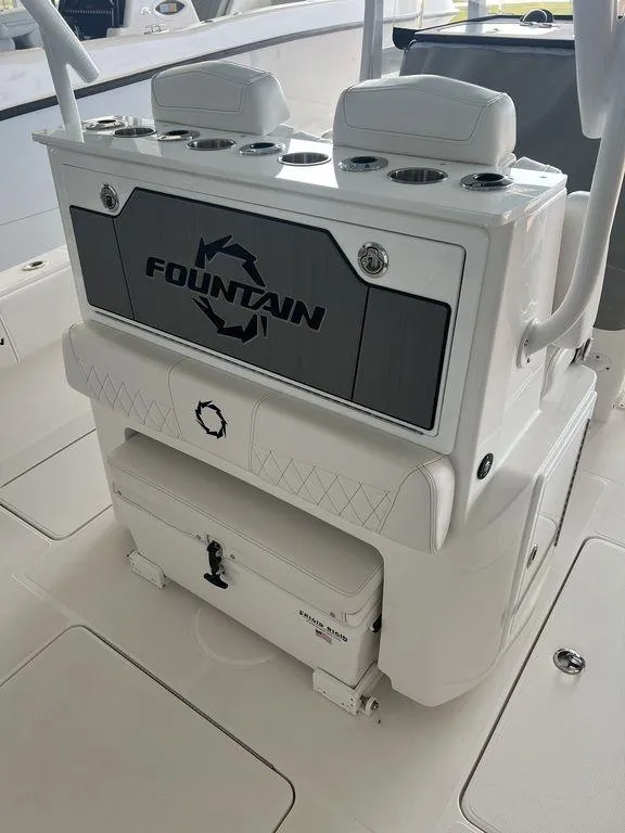 Slide: The Image of 2024 Fountain 34 TE boat interior with seating and storage. - 16