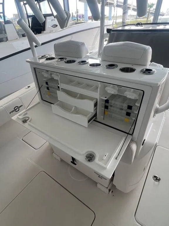 Slide: The Image of 2024 Fountain 34 TE boat with open tackle storage and seating. - 17