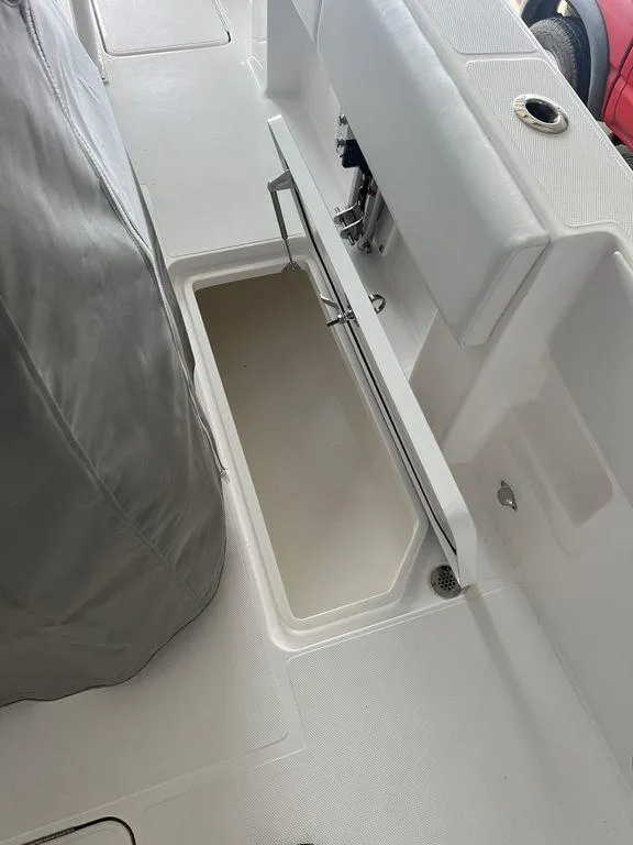 Slide: The Image of 2024 Fountain 34 TE boat interior storage compartment. - 27