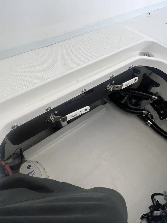 Slide: The Image of 2024 Fountain 34 TE boat interior, showing mechanical components and wiring. - 37
