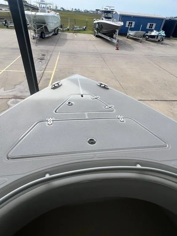 Slide: The Image of 2024 Fountain 34 TE boat bow view at a marina. - 39