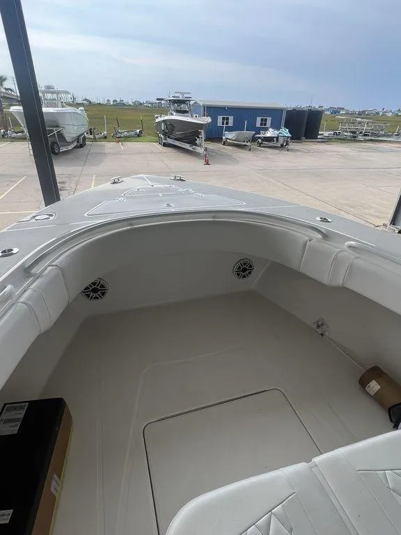 Slide: The Image of 2024 Fountain 34 TE boat interior view at a marina. - 40