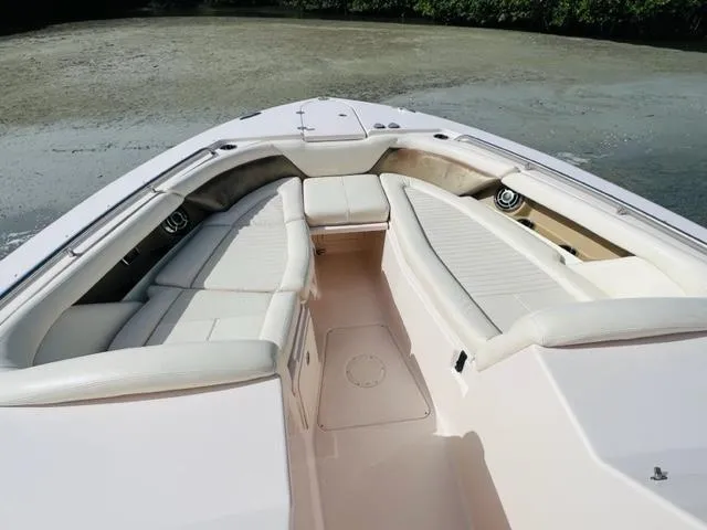 Slide: The Image of 2014 Grady-White Freedom 335 boat interior with spacious seating. - 13