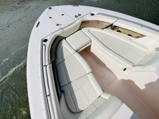 Slide: The Image of 2014 Grady-White Freedom 335 boat with spacious seating area. - 14