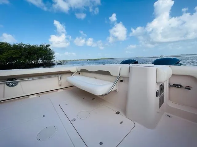 Slide: The Image of 2014 Grady-White Freedom 335 boat deck with scenic water view. - 31