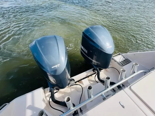 Slide: The Image of 2014 Grady-White Freedom 335 with twin Yamaha outboard engines on water. - 9