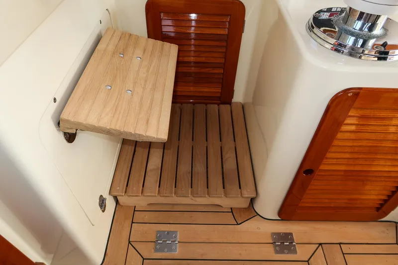Slide: The Image of Teak wood seating area on 2003 Hinckley Talaria 44 Express yacht. - 20