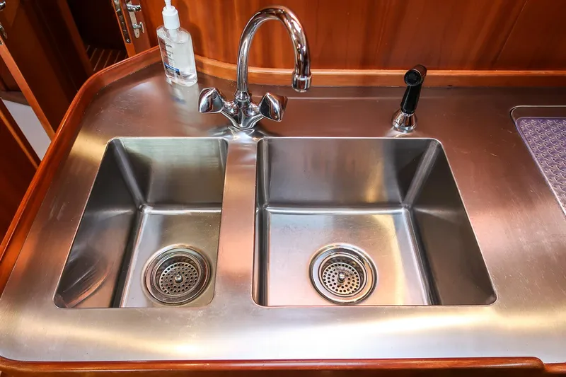 Slide: The Image of Stainless steel double sink on 2003 Hinckley Talaria 44 Express yacht. - 30
