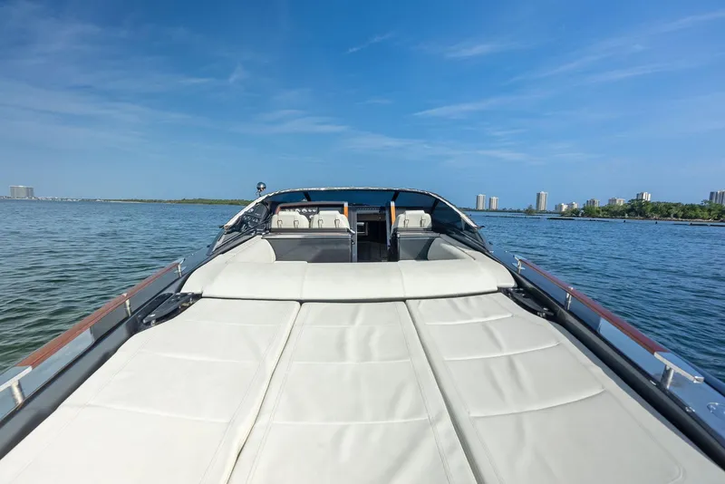 Slide: The Image of 2017 Riva Rivamare luxury yacht on calm waters with city skyline. - 18