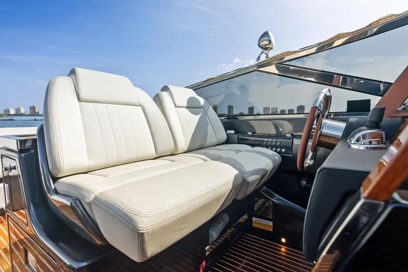 Slide: The Image of Luxurious interior of 2017 Riva Rivamare yacht with white leather seats. - 19