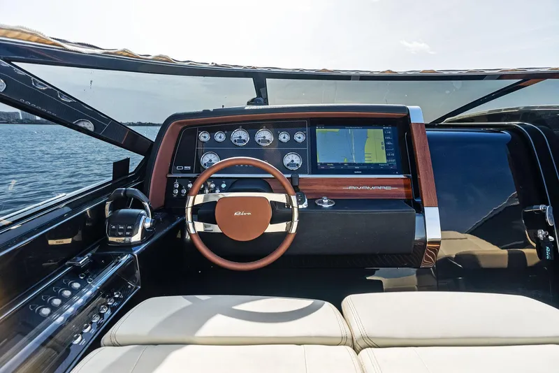 Slide: The Image of 2017 Riva Rivamare yacht dashboard with steering wheel and navigation system. - 21