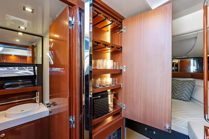 Slide: The Image of Luxurious interior of 2017 Riva Rivamare yacht with wooden cabinets and modern amenities. - 25