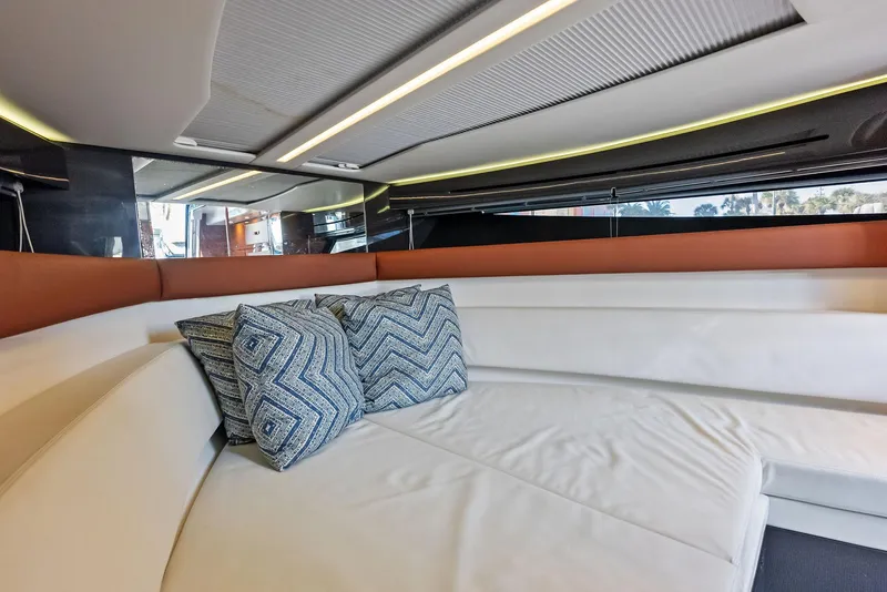 Slide: The Image of Interior of 2017 Riva Rivamare yacht with white seating and patterned cushions. - 31