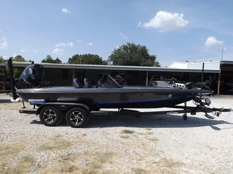 The Image of 2020 Falcon Boats 21TE on trailer, parked outdoors. - 1
