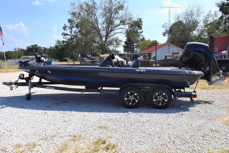 Slide: The Image of 2020 Falcon Boats 21TE on trailer, parked outdoors. - 17