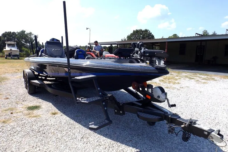 Slide: The Image of 2020 Falcon Boats 21TE on trailer in outdoor setting. - 18