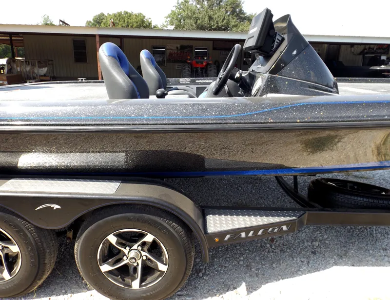 Slide: The Image of 2020 Falcon Boats 21TE on trailer, side view. - 21