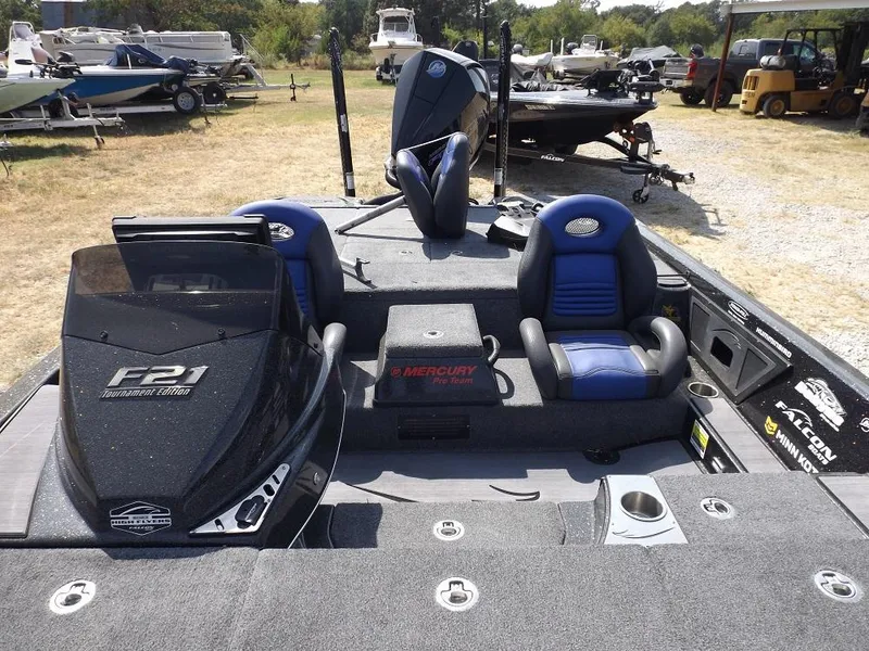 Slide: The Image of 2020 Falcon Boats 21TE interior with dual seats and Mercury engine. - 5