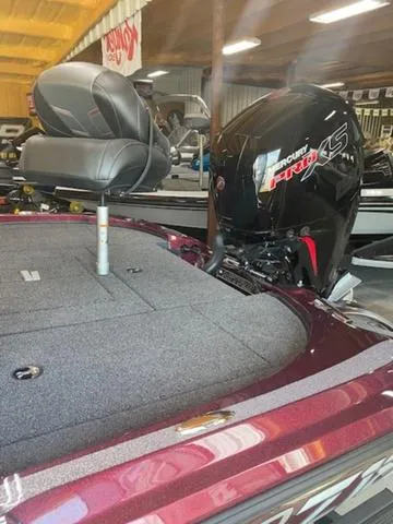 Slide: The Image of 2024 Nitro Z18 boat with Mercury Pro XS engine in showroom. - 4