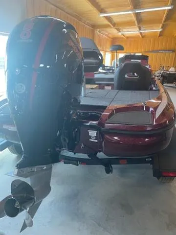 Slide: The Image of 2024 Nitro Z18 boat with powerful outboard motor in a showroom. - 6